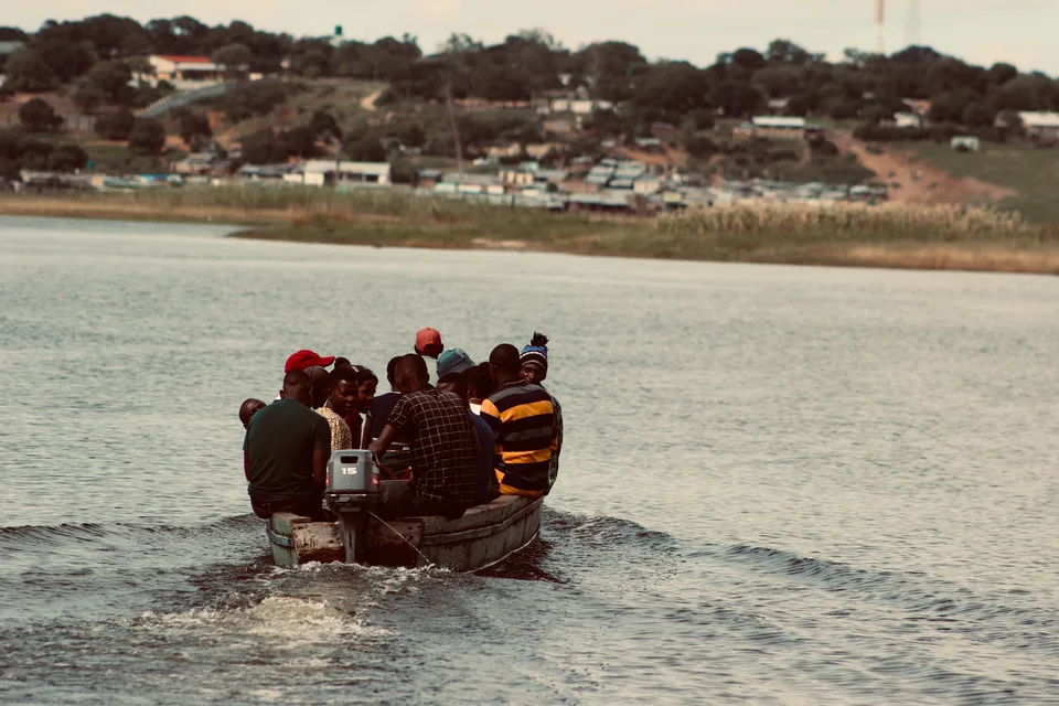 A water taxi crossing the Zambezi on the Barotse floodplain, Western Province, Zambia